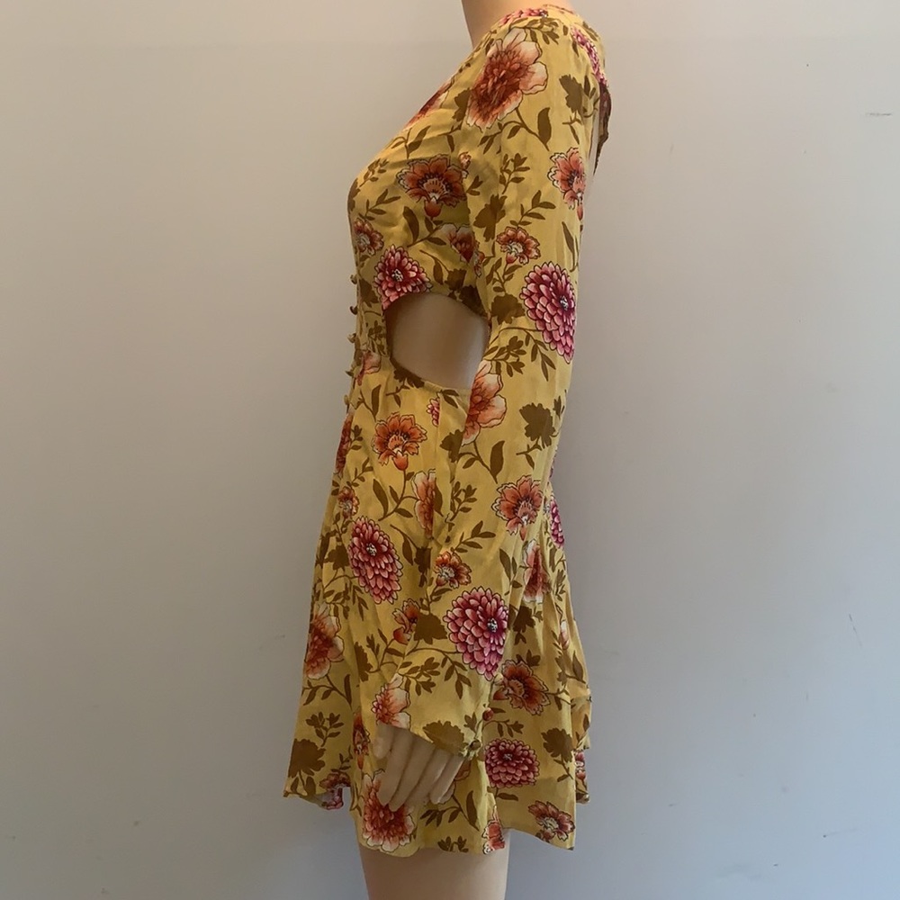 Floral print dress with cut outs